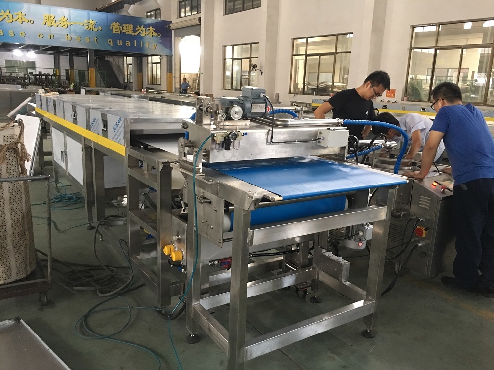 บล็อกบริษัทล่าสุดเกี่ยวกับ คู่มือการเลือกสายการผลิตตกแต่งและทำความเย็นป๊อปคอร์น – ปัจจัยสำคัญตั้งแต่การควบคุมกระบวนการจนถึงประสิทธิภาพการผลิต