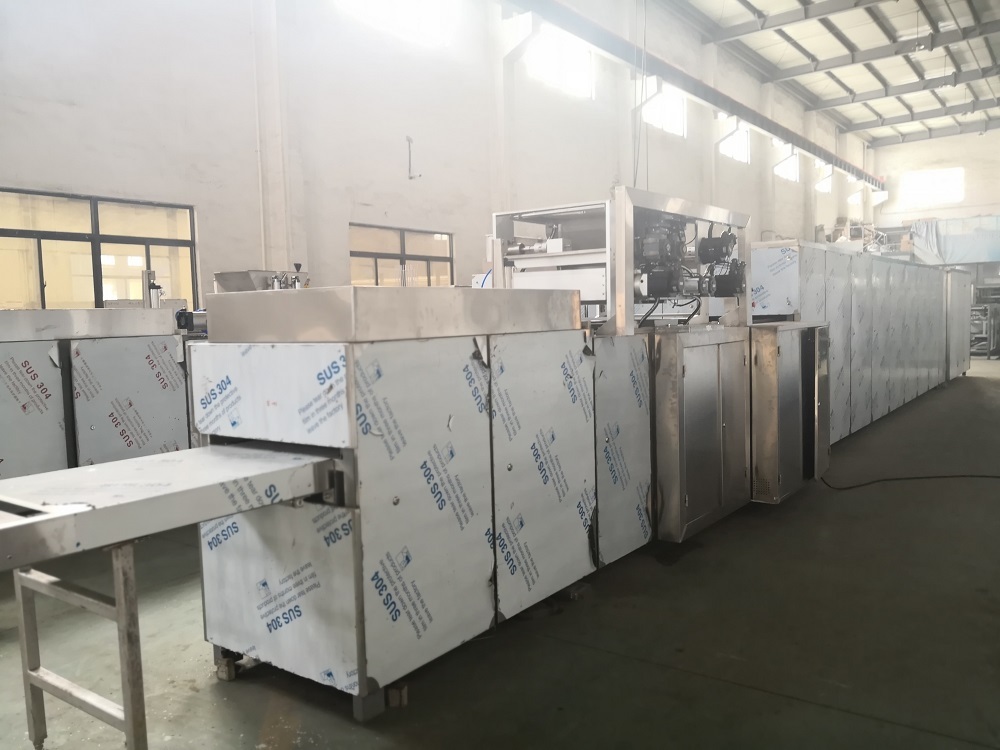 บล็อกบริษัทล่าสุดเกี่ยวกับ คู่มือการเลือกสายการผลิตช็อกโกแลต – ตั้งแต่การออกแบบผลิตภัณฑ์จนถึงการควบคุมอุณหภูมิ